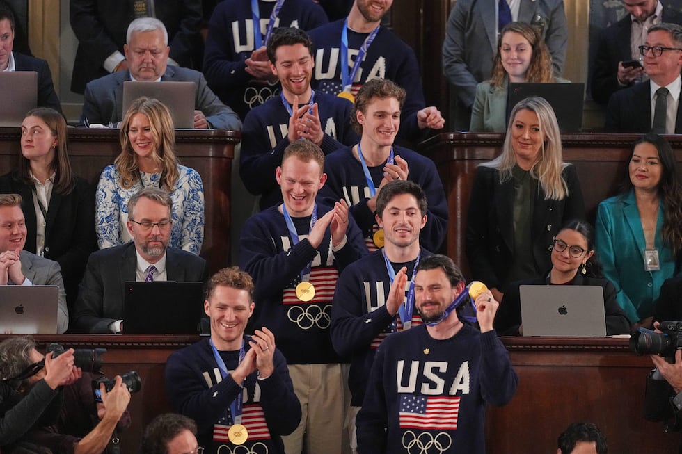 Members of the United States' hockey team attend as President Donald Trump delivers the State...