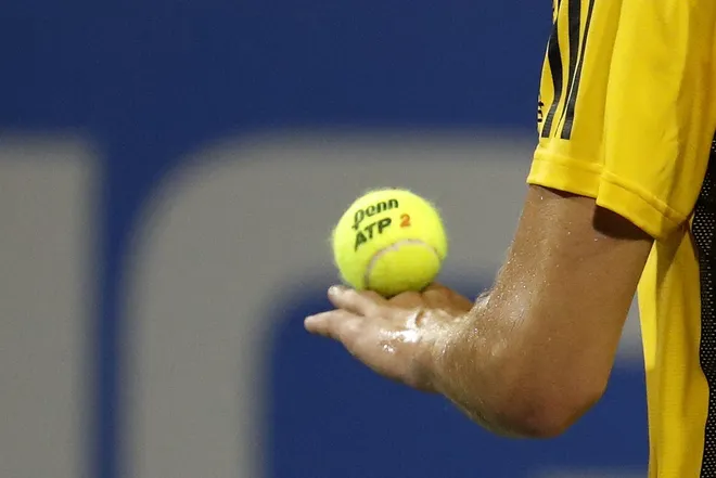 Aug 1, 2017; Washington, DC, USA; Dominic Thiem of Austria balances a ball on his hand prior to serving against Henri Laaksonen of Switzerland (not pictured) on day two of the Citi Open at Fitzgerald Tennis Center. Thiem won 6-3, 6-3.