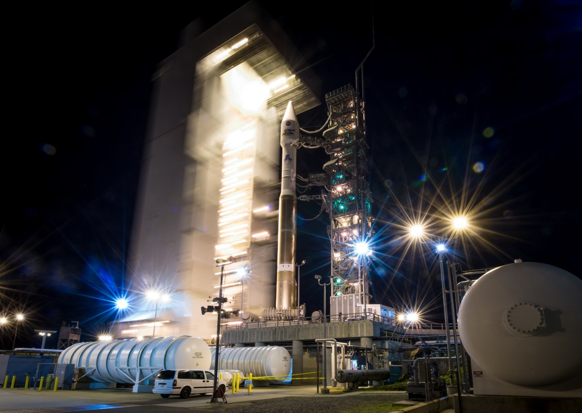 The launch pad tower at SLC-3 is rolled back to reveal the United Launch Alliance (ULA) Atlas-V rocket with the Landsat Data Continuity Mission (LDCM) spacecraft onboard on Monday, Feb. 11, 2013 at Vandenberg Air Force Base, Calif.