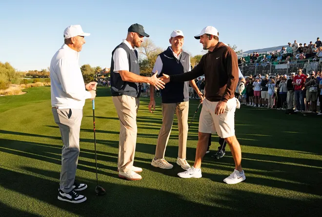 Scottie Scheffler greets Kansas City Chiefs tight end Travis Kelce on the first tee box ahead of the 2026 Annexus Pro-Am at the WM Phoenix Open.