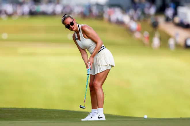 Paige Spiranac watches a putt on the 10th hole during the 2024 Creator Classic.
