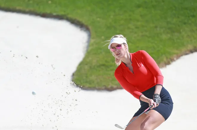 Social media personality Paige Spiranac hits from the sand during the second round of the PGA TOUR Champions Bass Pro Shops Legends of Golf.