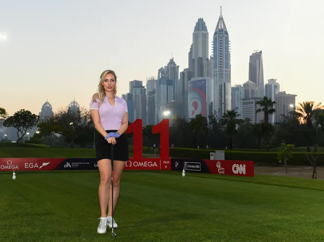Paige Spiranac of United States poses for photographs on Day One of the Omega Dubai Moonlight Classic.