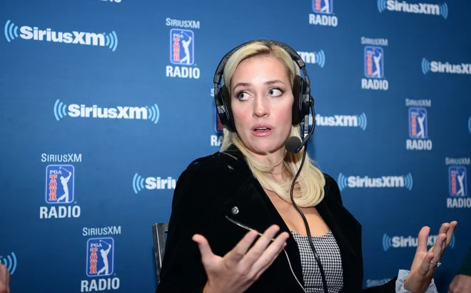 Paige Spiranac speaks at the PGA Merchandise Show.