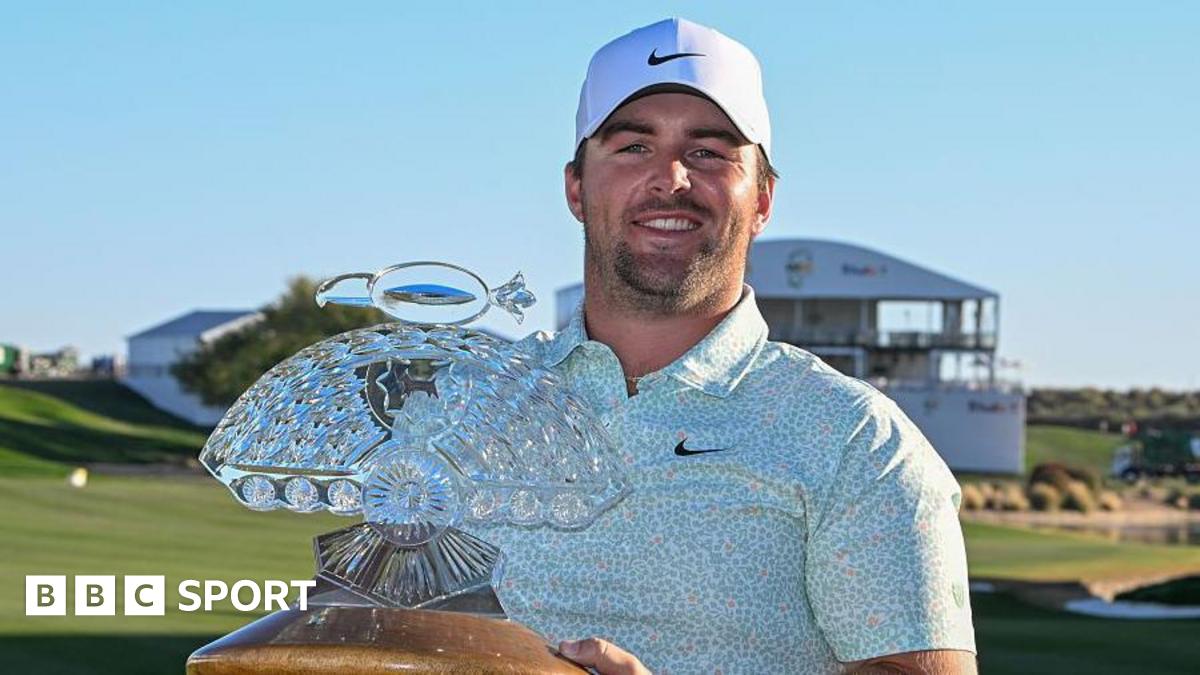 Chris Gotterup holds the Phoenix Open trophy