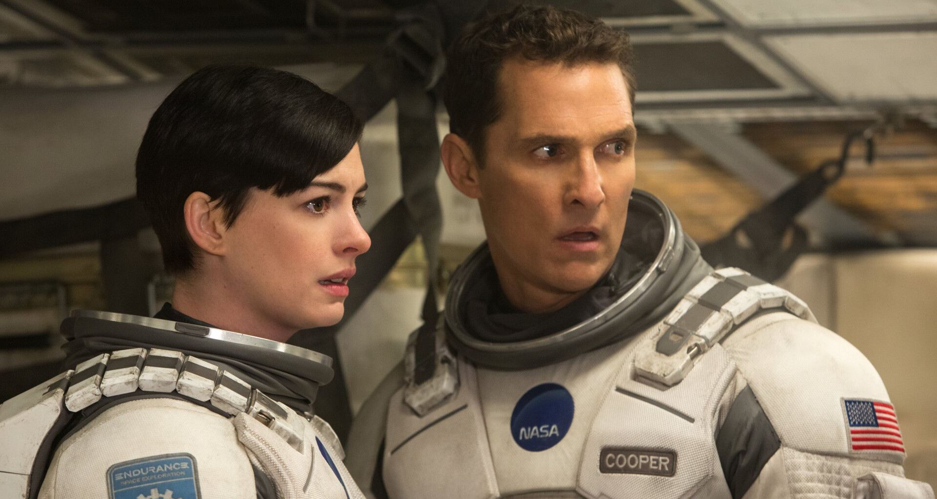 Matthew McConaughey as Joseph "Coop" Cooper and Anne Hathaway as Dr. Amelia Brand in Interstellar.