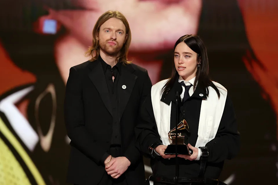 Finneas O'Connell and Billie Eilish accept the Grammy for Song of the Year.