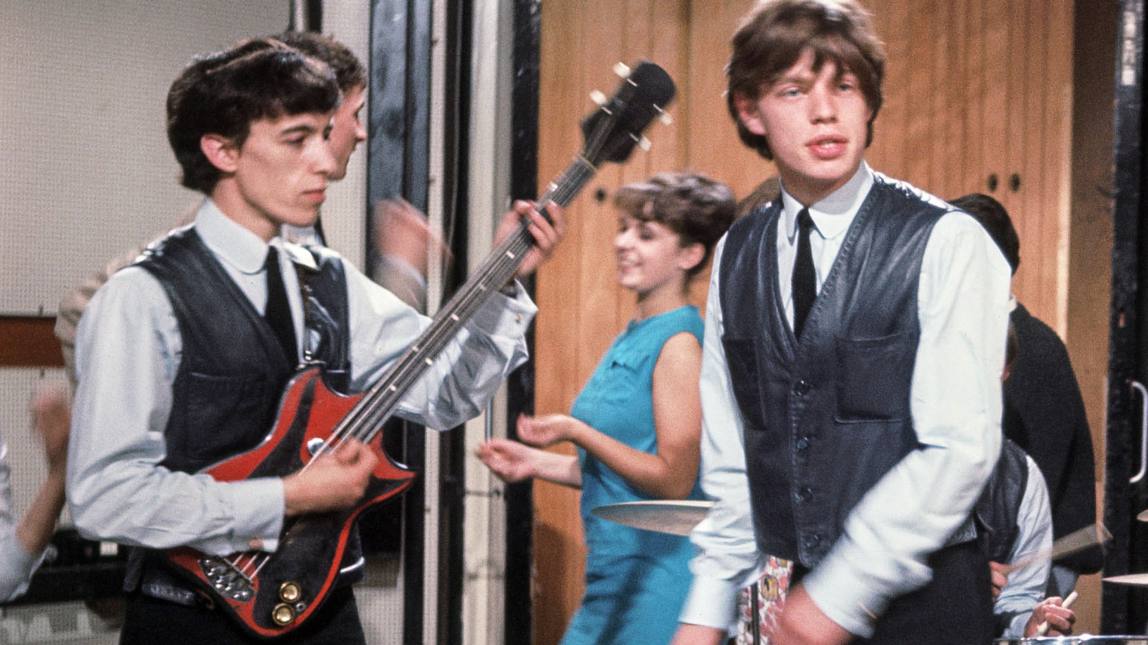 The ROLLING STONES during their first TV appearance on Ready Steady Go on 2 August 1963 performing Come On. Bill Wyman is playing his self-modified Dallas Tuxedo bass