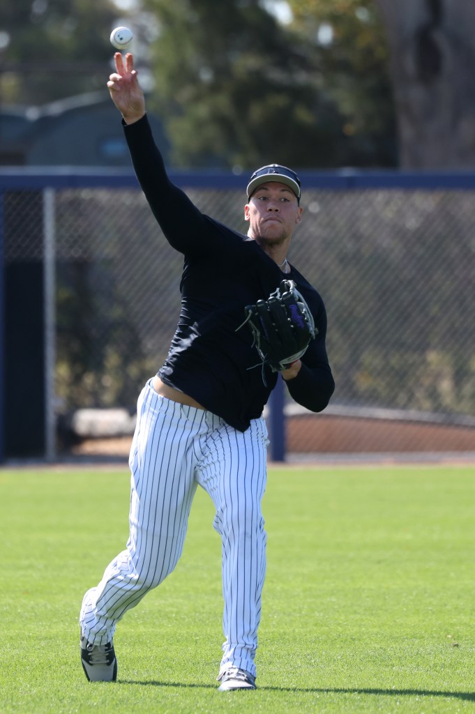 Aaron Judge throwing a baseball at Yankees Spring Training in Tampa, Florida.