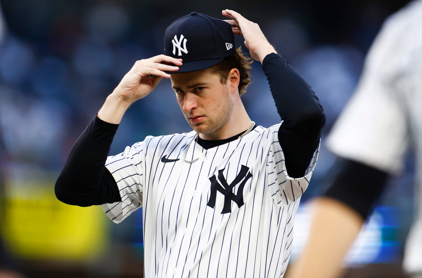 Yankees starter Cam Schlittler is dealing with back inflammation and a lat issue at the start of spring training.