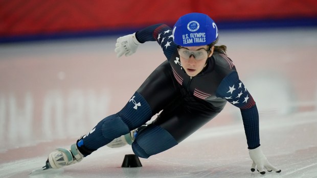Julie Letai competes in the women's 500-meter quarterfinals during the U.S. Olympic short track speedskating trials Sunday, Dec. 19, 2021, in Kearns, Utah. (AP Photo/Rick Bowmer)