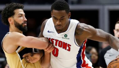 Detroit Pistons center Jalen Duren (0) drives against Washington Wizards forward Anthony Gill during the first half of an NBA basketball game, Thursday, Feb. 5, 2026, in Detroit. (AP Photo/Duane Burleson)