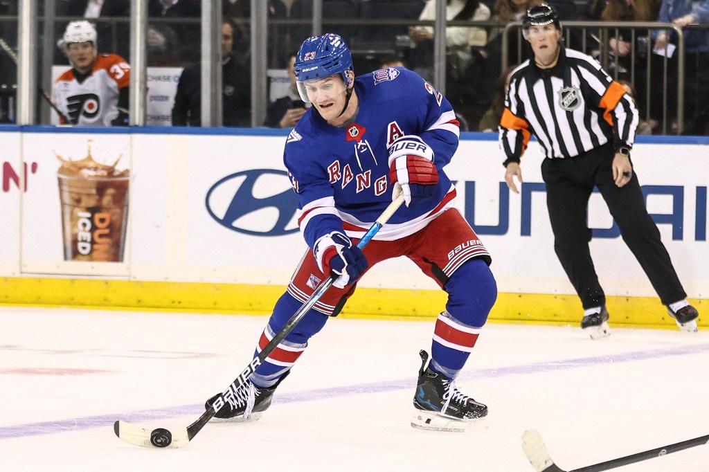 Adam Fox looks to make a pass during the Rangers' 3-2 overtime loss to the Flyers at the Garden on Feb. 26, 2026.