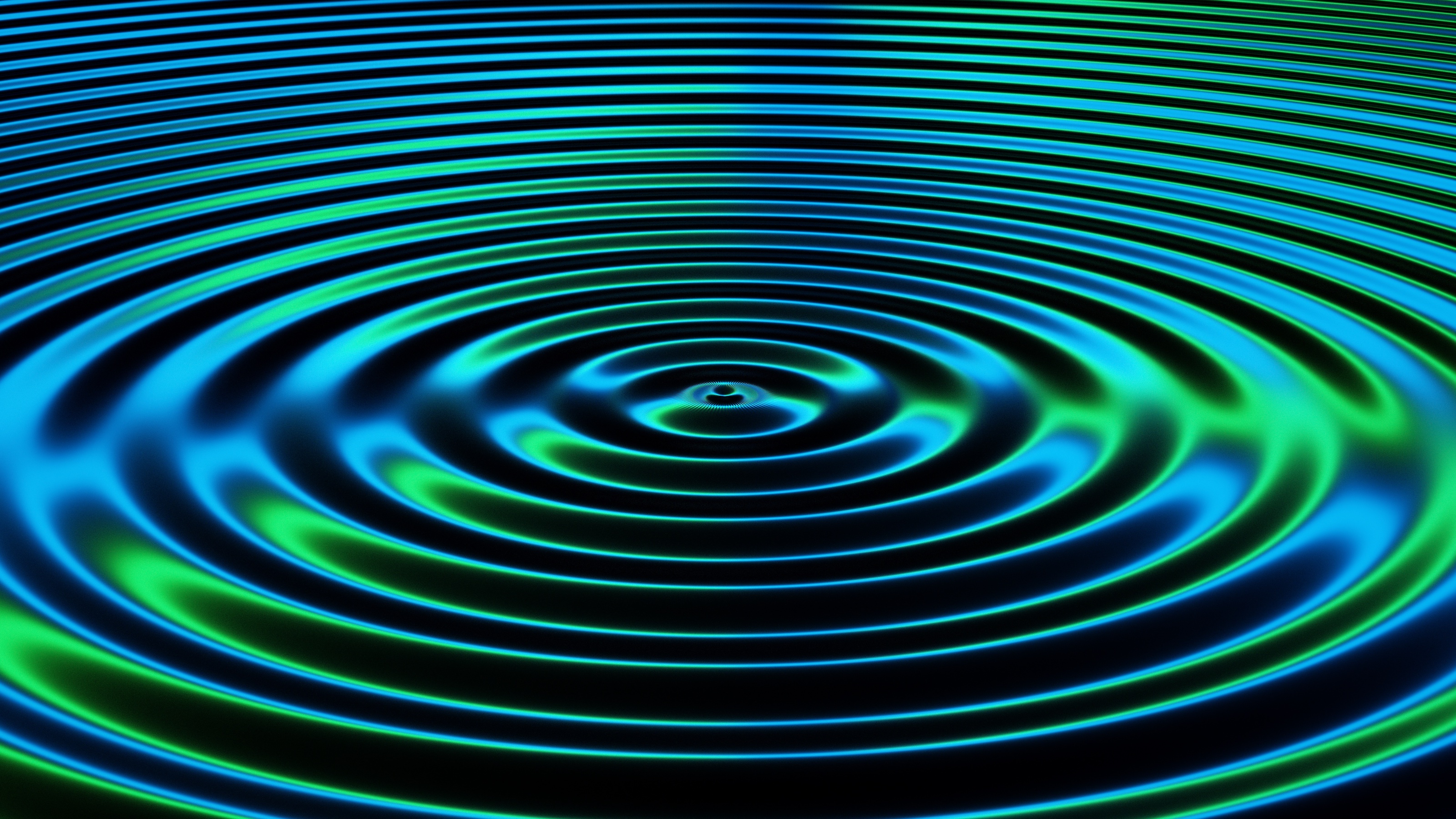 Concentric blue and green waves