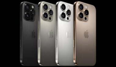 A side view of four Apple iPhone 15 Pro Max smartphones in different colors, showcasing their camera setups and logo.