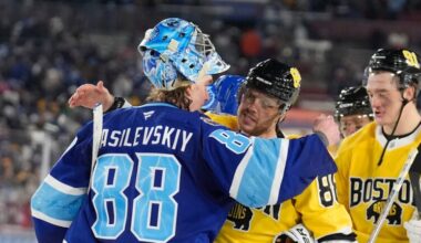 Tampa Bay Lightning goaltender Andrei Vasilevskiy (88) hugs Boston Bruins right wing David Pastrnak after the Lightning defeated the Bruins during a shootout in a Stadium Series NHL hockey game Sunday, Feb. 1, 2026, in Tampa, Fla.