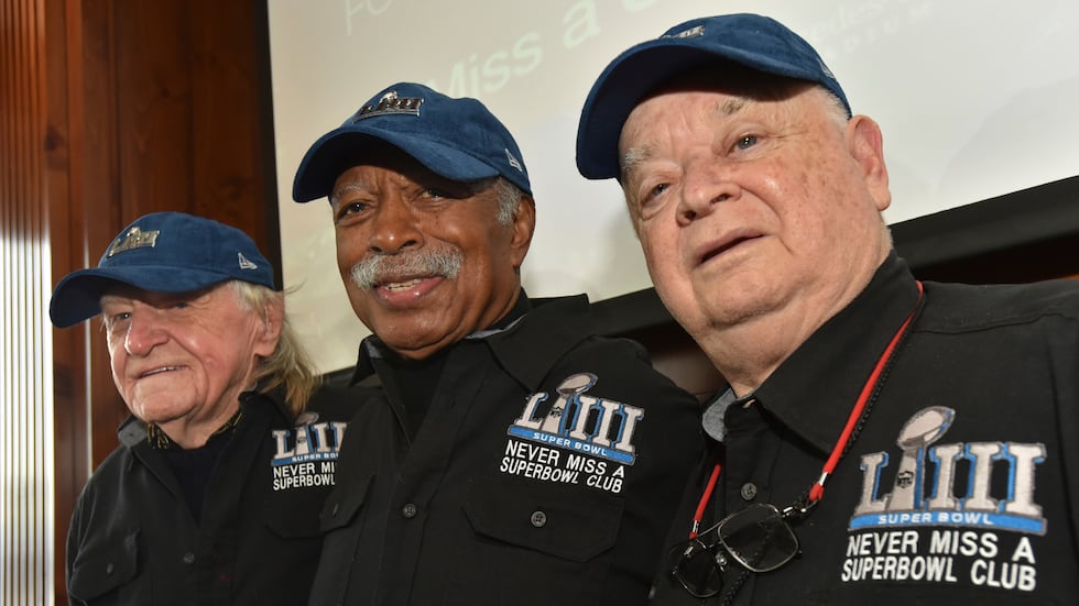 FILE — Members of the Never Miss a Super Bowl Club, from the left, Tom Henschel, Gregory...
