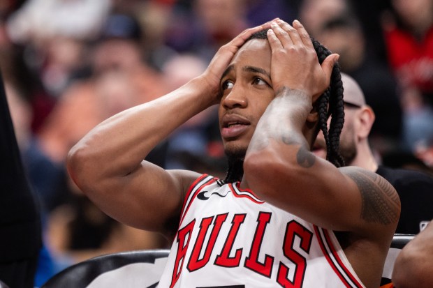 Chicago Bulls guard Rob Dillingham (7) reacts on the bench in the second half of a game against the Toronto Raptors at the United Center in Chicago on Feb. 19, 2026. (Josh Boland/Chicago Tribune)