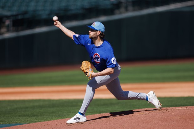 Colin Snider pitches during live batting practice during Cubs spring training at Sloan Park on Feb. 19, 2026, in Mesa, Ariz. (Armando L. Sanchez/Chicago Tribune)