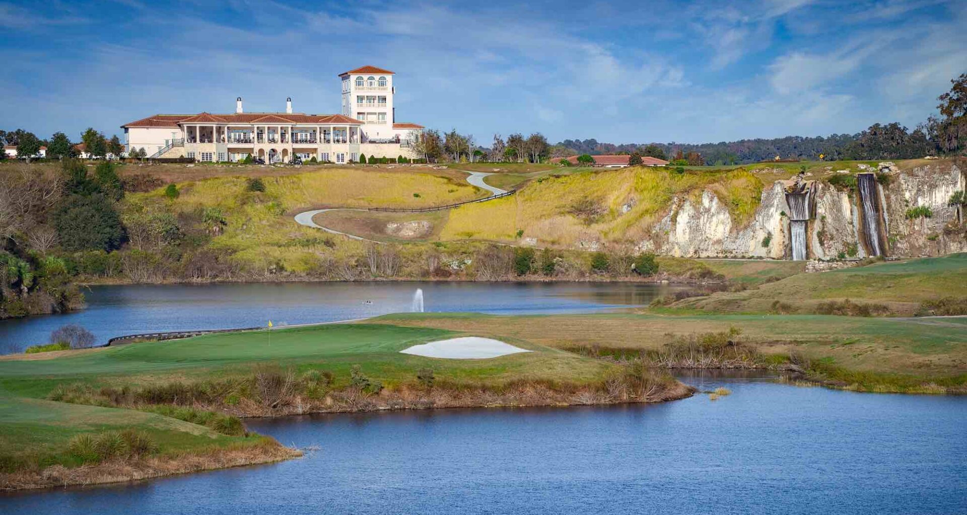 Club at Iron Lake Clubhouse view over the waterfalls and lake at the facility in Ocala.