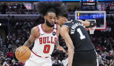 Chicago Bulls guard Coby White, left, drives to the basket past San Antonio Spurs center Victor Wembanyama, right, in Chicago, Monday, Jan. 6, 2025. (AP File Photo/Nam Y. Huh)