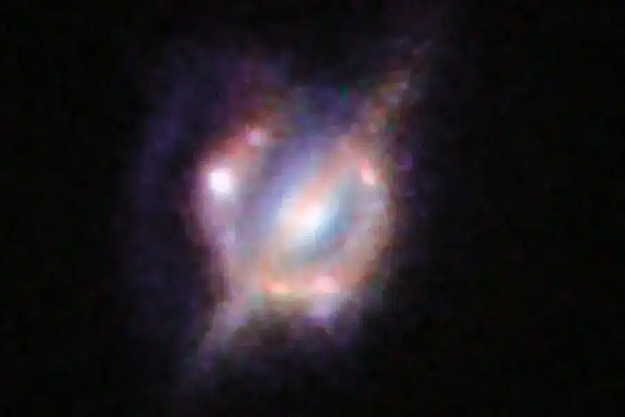 Composite Image From Hubble And Keck Ii Showing A Foreground Galaxy Lensing H1429 0028 Into A Ring.