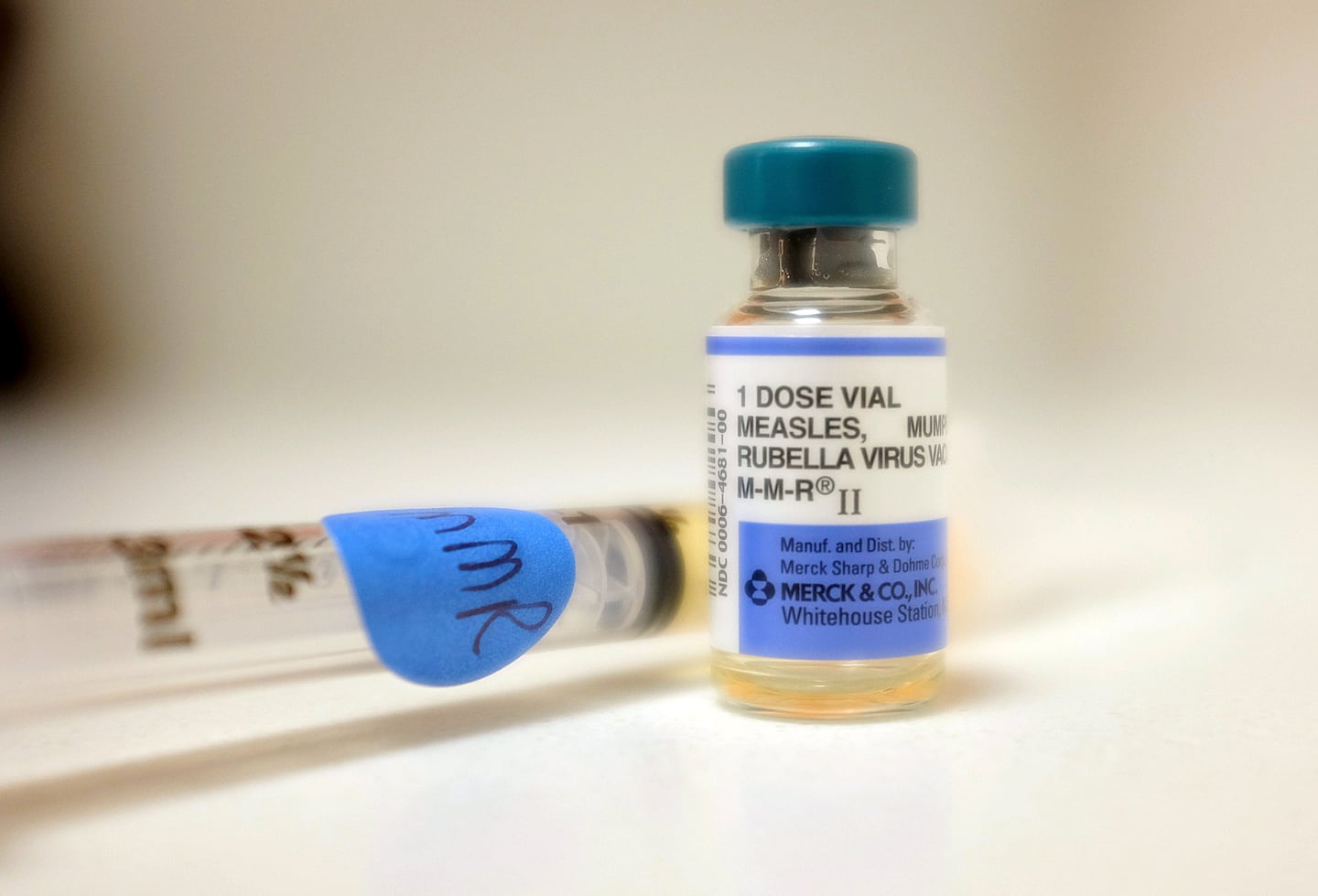 A bottle of measles vaccination.
