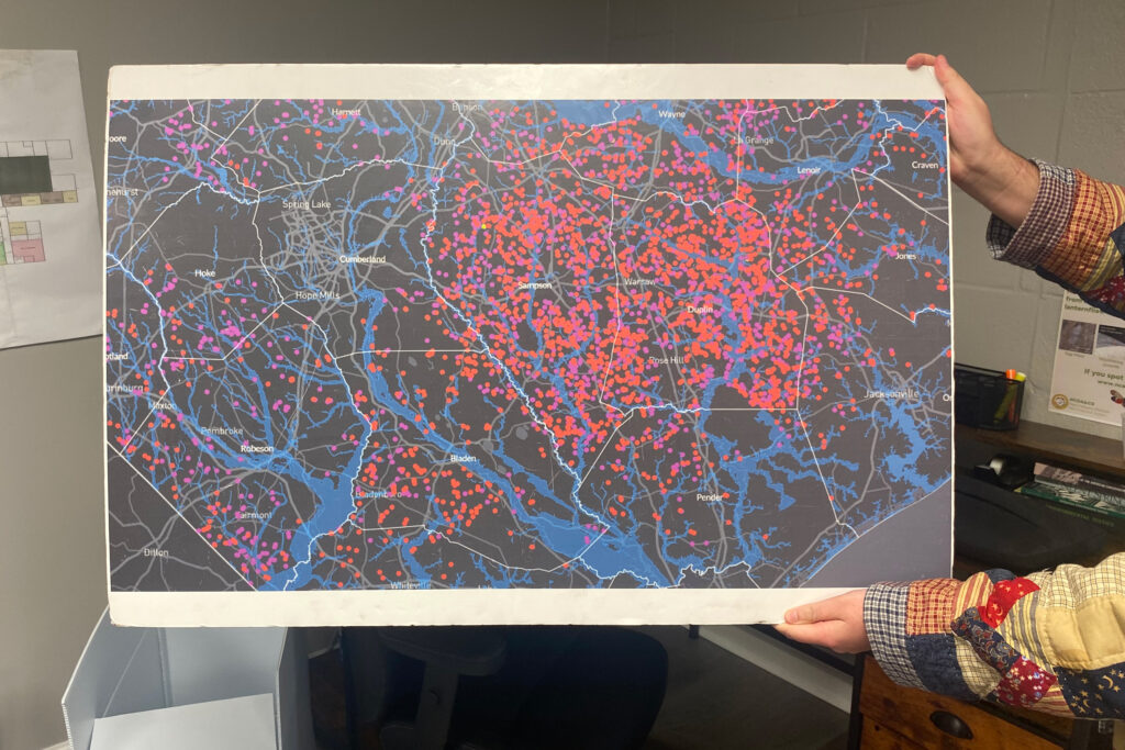 A map in the Environmental Justice Community Action Network office shows industrial poultry and swine farms in eastern North Carolina. Credit: Blanca Begert/Inside Climate News