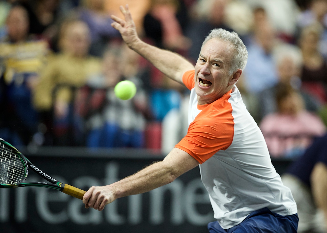 ‘You cannot be serious’: John McEnroe lashes out at stalking fan at Melbourne airport