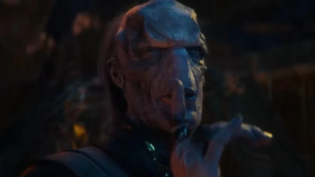 Ebony Maw shushing Doctor Strange with a finger over his lips in Avengers: Infinity War