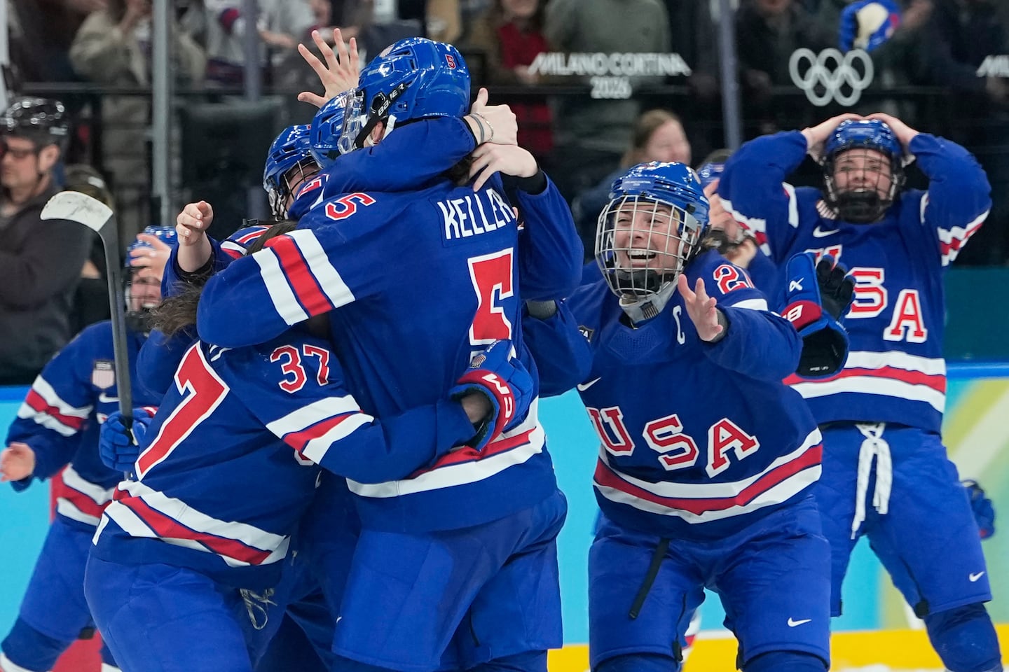 United States' Megan Keller (5) celebrates scoring the winning goal during the US-Canada women's gold medal game in Milan on Thursday. (AP Photo/Petr David Josek)