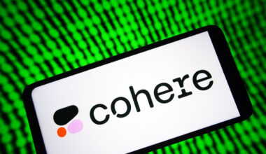 Image of a phone with Cohere's logo on it with a green digital background.