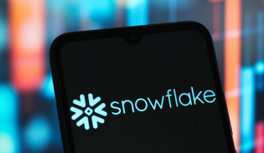 In this photo illustration, the Snowflake logo is seen displayed on a smartphone screen.