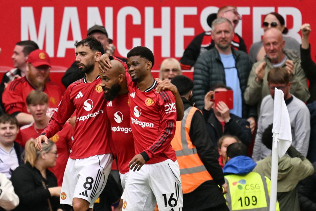 Bryan Mbeumo celebrates scoring with Bruno Fernandes and Amad Diallo during the Premier League match between Manchester United and Burnley at Old Trafford in Manchester, England, in 2025.