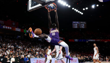 Khaman Maluach #10 of Phoenix Suns dunks the ball during the NBA China Games 2025 between Brooklyn ...