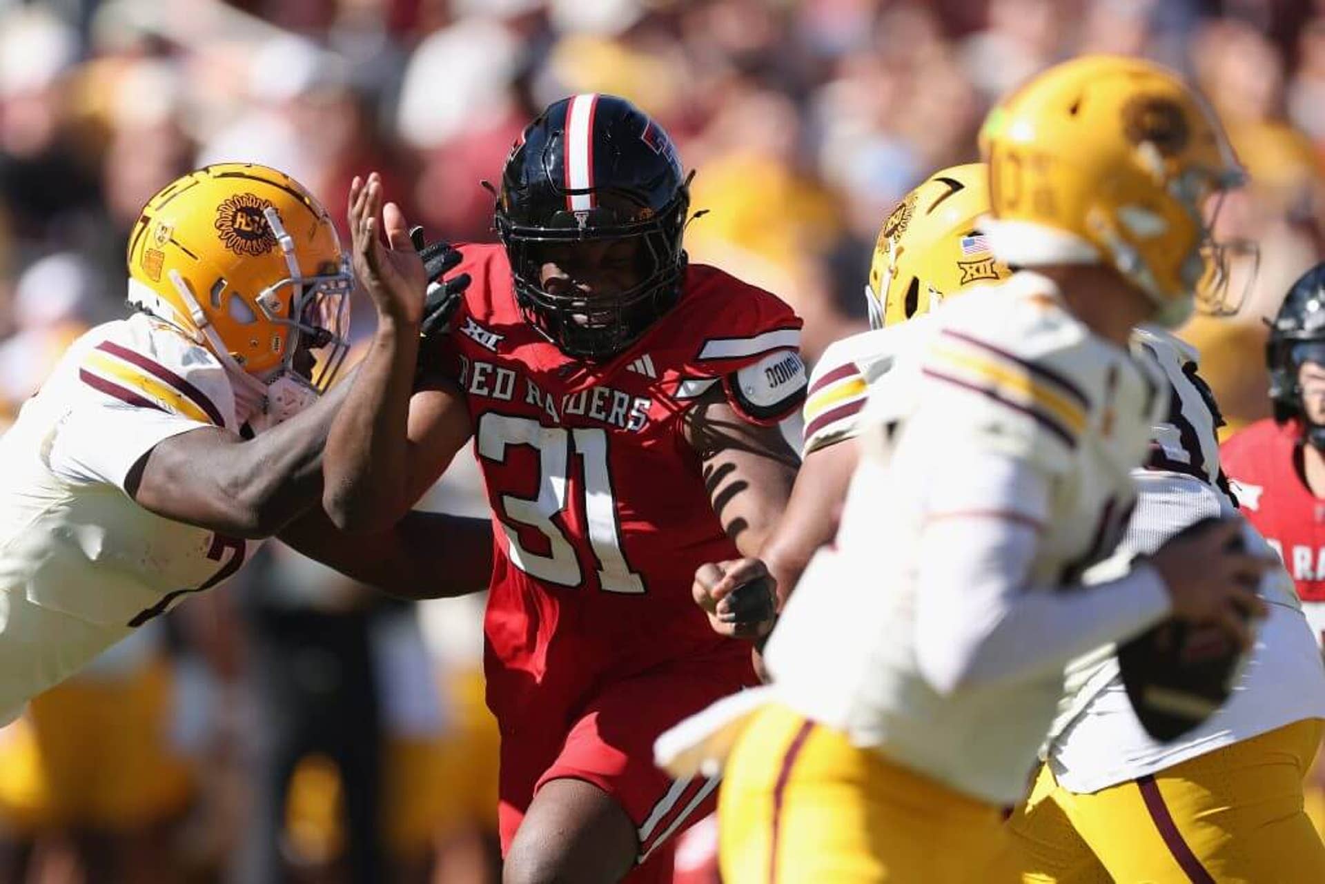 Texas Tech edge David Bailey rushes Arizona State quarterback Sam Leavitt