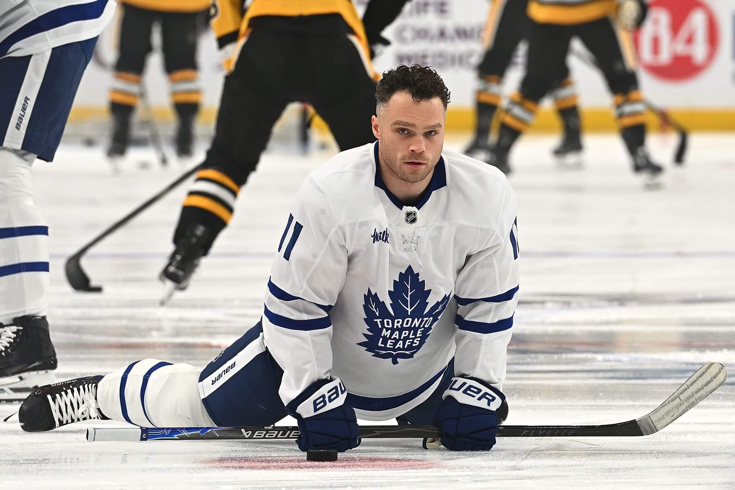 Max Domi stretches during Leafs warmups.