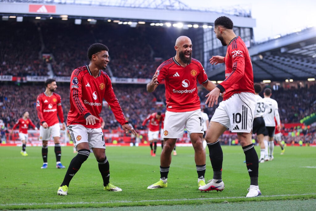 Matheus Cunha of Manchester United celebrates with Bryan Mbeumo and Amad