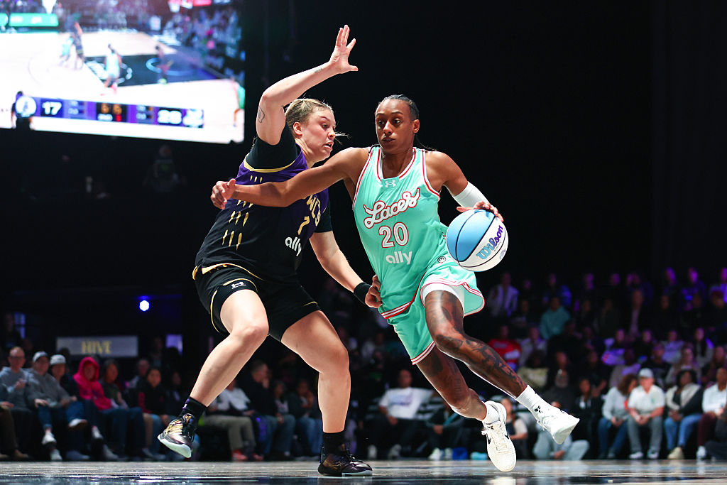 MEDLEY, FLORIDA - FEBRUARY 06: Brittney Sykes #20 of the Laces drives against Rachel Banham #1 of the Lunar Owls during the second quarter of the Unrivaled 2026 game at Sephora Arena on February 06, 2026 in Medley, Florida.