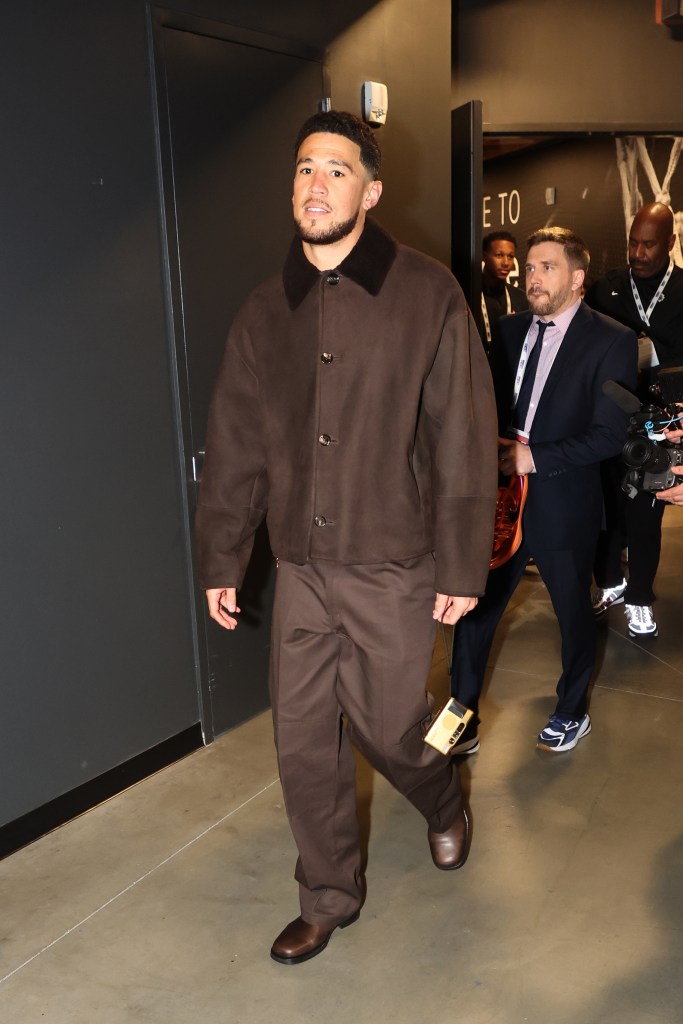 Devin Booker arrives to the NBA All-Star Game.