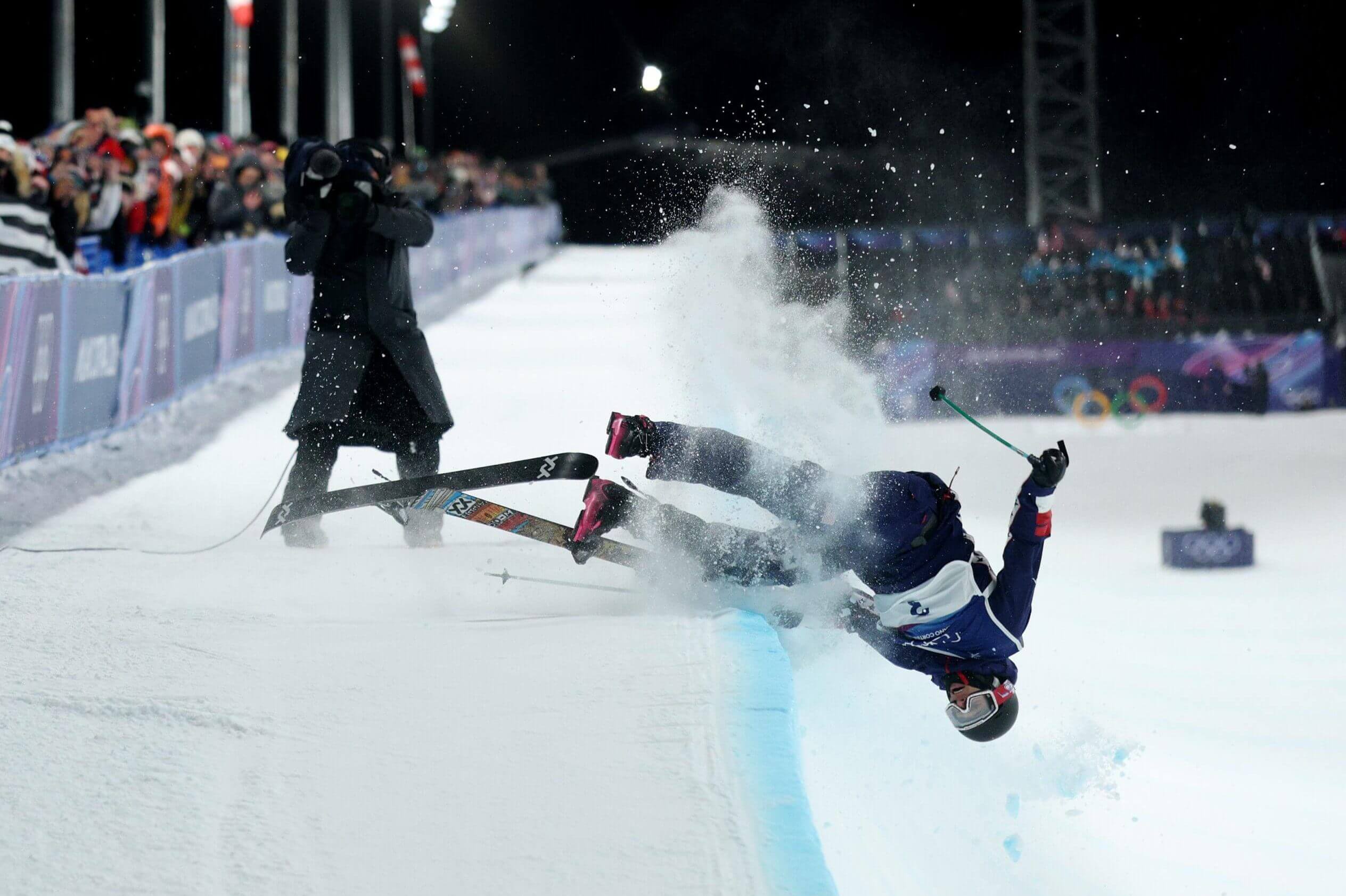 Nick Goepper of the United States, with his head pointed down, landed hard on the deck in his final jump on his final run of the freeski halfpipe competition.