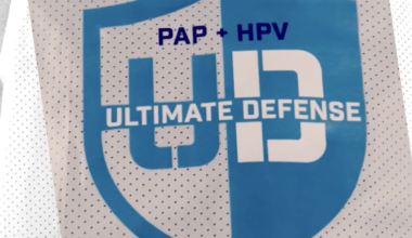 "Ultimate Defense" campaign logo on a basketball jersey