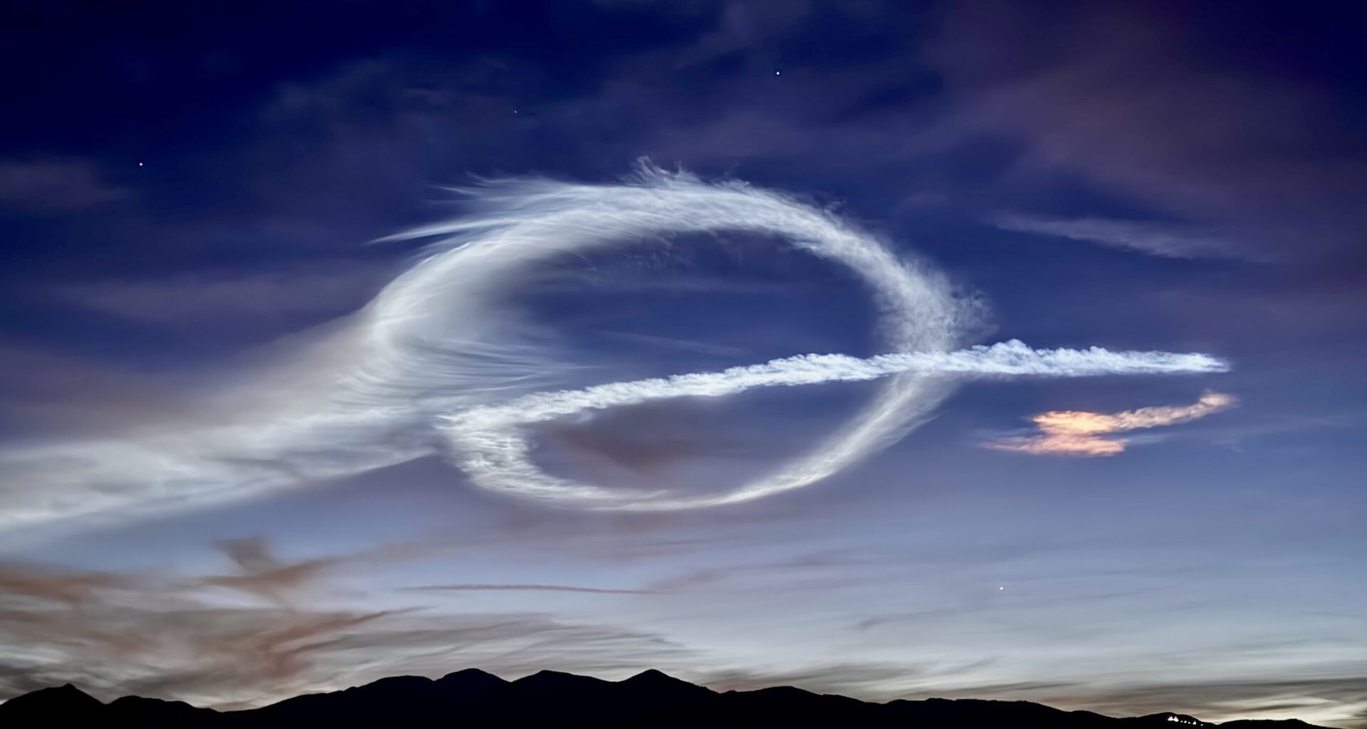 SpaceX Falcon 9 Launch Creates Glowing Spiral Visible Across Victor Valley