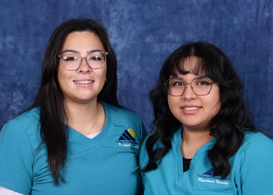 Isabella Cantu (left) and Karina Silva (right), both CEI nursing students, proudly representing the college in their nursing scrubs.