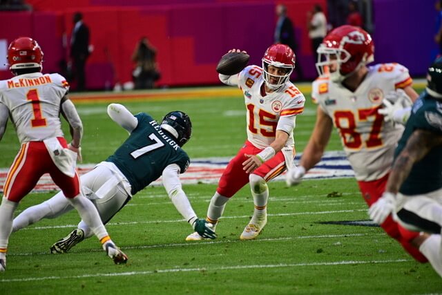 Kansas City Chiefs quarterback Patrick Mahomes evades a sack at Super Bowl LVII in Glendale, Ariz.