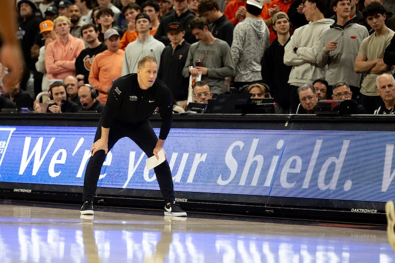 BYU head coach Kevin Young stands on the baseline during game against Oklahoma State, Wednesday, Feb. 4, 2026 in Stillwater, Okla.
