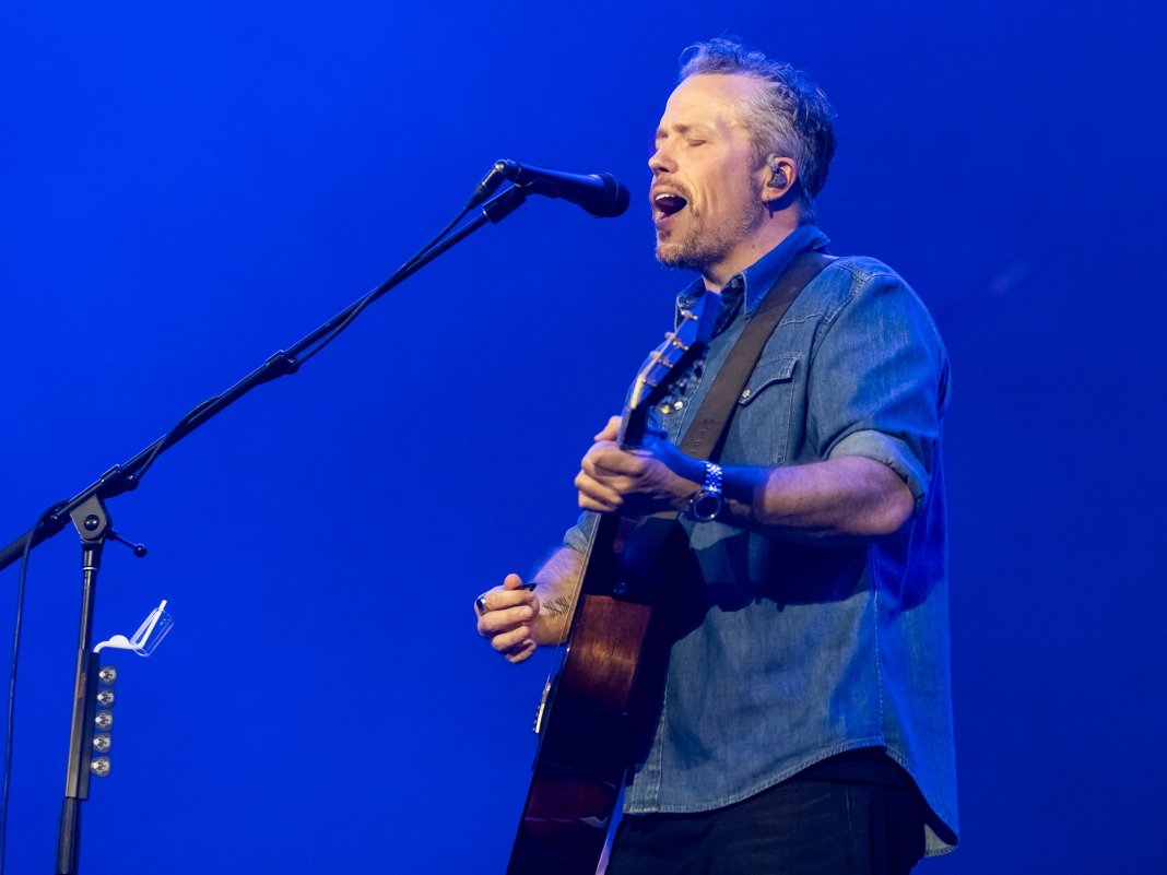 Jason Isbell elaborates on his unorthodox method of breaking guitars in by playing Outkast for hours straight