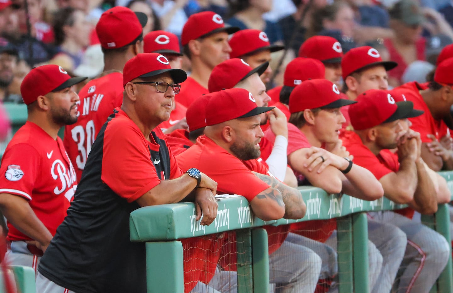 After taking a year off, Terry Francona (second from left) returned to manage the Reds.