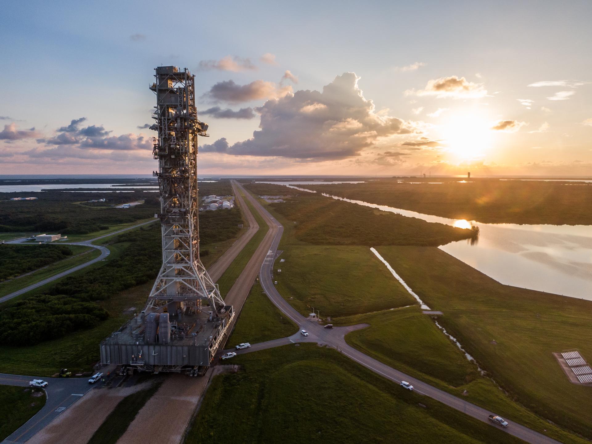 A drone camera captures NASA’s mobile launcher 1 atop the agency’s crawler-transporter 2 moving from Launch Complex 39B to the Vehicle Assembly Building at NASA’s Kennedy Space Center in Florida on Thursday, Oct. 3, 2024. The mobile launcher has been at the launch pad since August 2023 undergoing upgrades and tests in preparation for NASA’s Artemis II mission. The mobile launcher will be used to assemble, process, and launch NASA’s SLS (Space Launch Systems) and Orion spacecraft to the Moon and beyond.