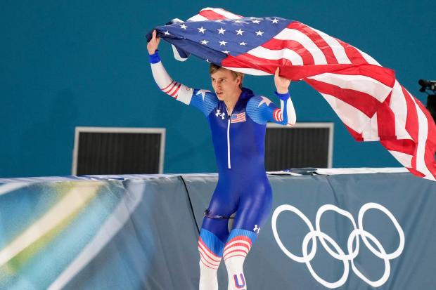 Gold medallist Jordan Stolz of the U.S. celebrates after the men's 500 meters speedskating race at the 2026 Winter Olympics, in Milan, Italy, Saturday, Feb. 14, 2026. (AP Photo/Luca Bruno)